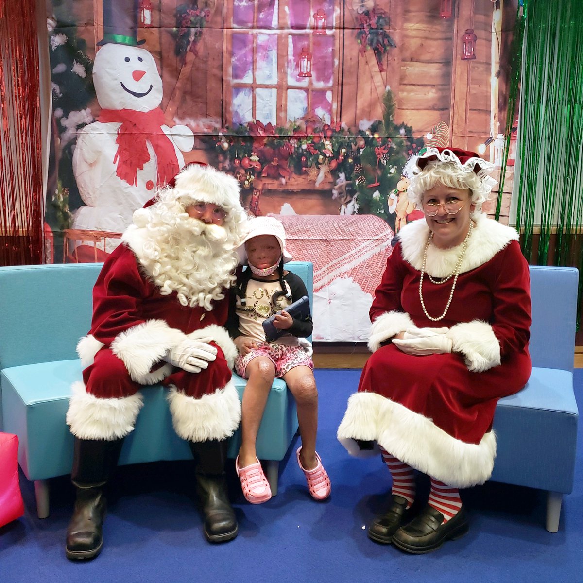 BosShrinersHosp's tweet photo. Esther had a great visit with Santa and Mrs. Claus during our annual Christmas in July celebration. Thank you to the BFFBF for bringing Christmas cheer to our Boston Shriners Hospital patients! #BosShriners #BFFBF https://t.co/0MhsKDtZ99