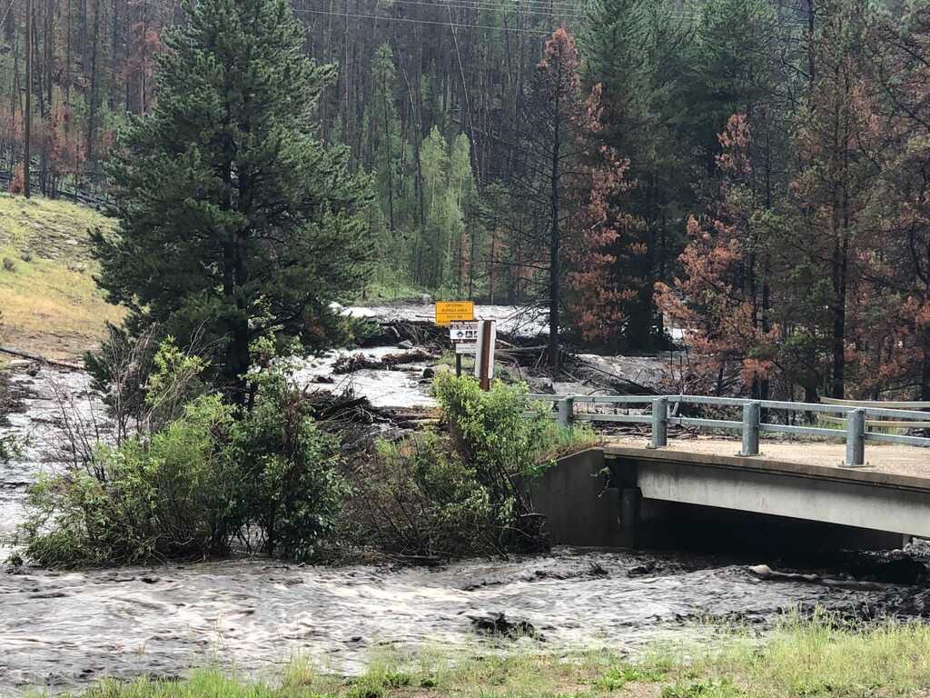 Image of #CO125 & Cabin Creek area. Rain is continuing. Water flow has increased near Hwy 40 & Hwy 125. There is some flowing water on Hwy 40, please travel with caution. #grandcounty