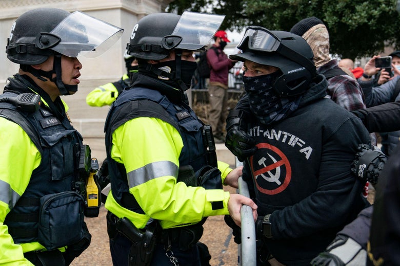NormieConcerned's tweet photo. #SeditionHunters Say hello to #AntiAntifaHoodie!  I've seen this guy in a few photos and I haven't really seen anyone mention him yet.  Apparently he was claiming to be a Proud Boy.  Location looks like South end of the West Plaza? https://t.co/UNufOAO34P