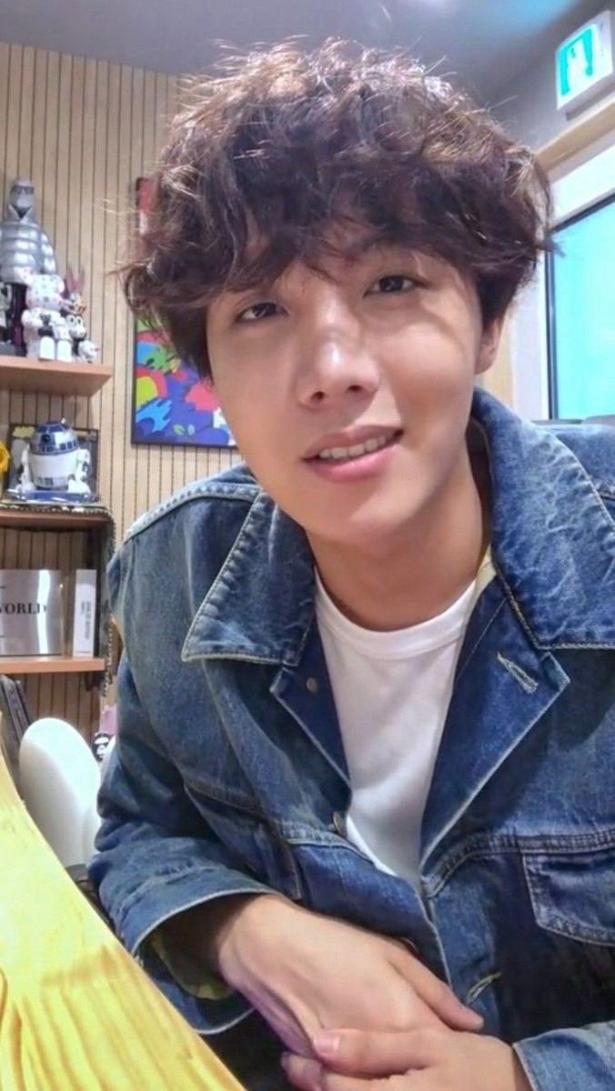 the curls.. the denim jacket… this Hoseok has tight grip on me.
