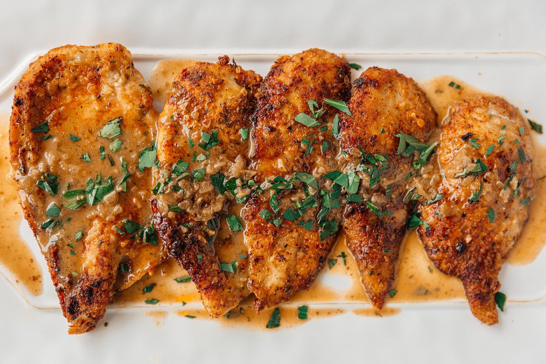 Boneless, skinless chicken breasts are one are a tender topic here at the shop. They present a variety of challenges, but we are committed to teaching the techniques to get you to juicy, flavorful chicken. 

This Chicken Cutlets with Tarragon Mustard Pan Sauce recipe fits the bil