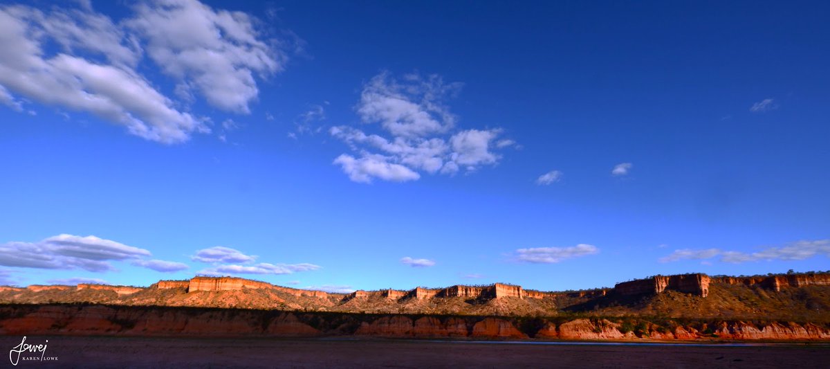 Sandstone towers meet the sky in this panoramic vista of the Chilojo Cliffs. 
<a href="/Karen/">Karen Comas</a> Lowe Photography 
#ChiloGorge #GonarezhouNationalPark #PlaceOfElephants #EdgeofSerenity #GonarezhouConservationTrust #Wildlife #DiscoverZimbabwe