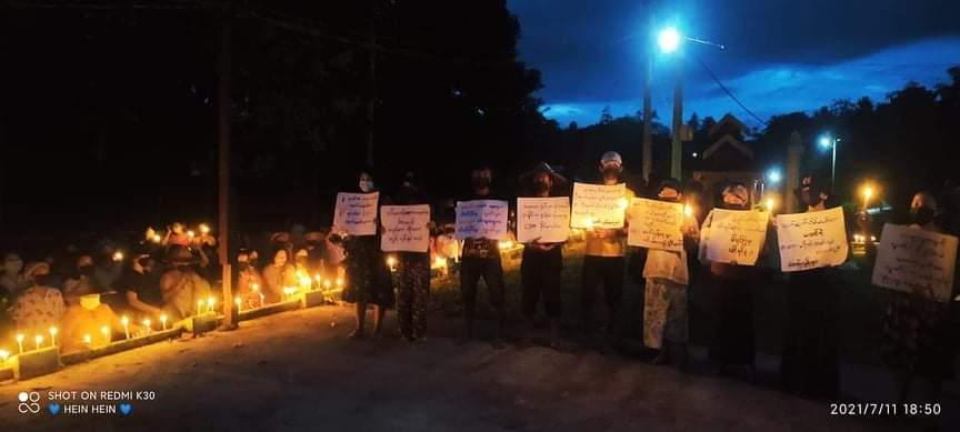 emeralmon's tweet photo. Anti-coup night #CandleLightStrike in Dawei's ThayetChaung, NyaungZin Vlg, Tanintharyi Region.  WE NEED HELP FOR COVID-19 #MyanmarNeedsO2 #July11Coup #WhatsHappeningInMyanmar https://t.co/DhMgRblfgG