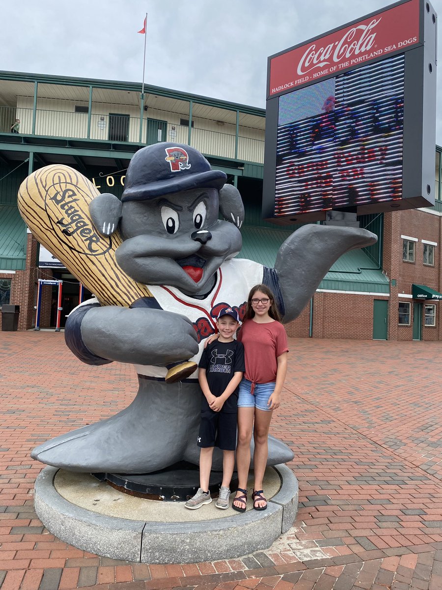 SDSuetterlein's tweet photo. .@PortlandSeaDogs game with grandchildren and their annual growth measurement with the @Slugger_SeaDog statue. https://t.co/xL1Me18AQN