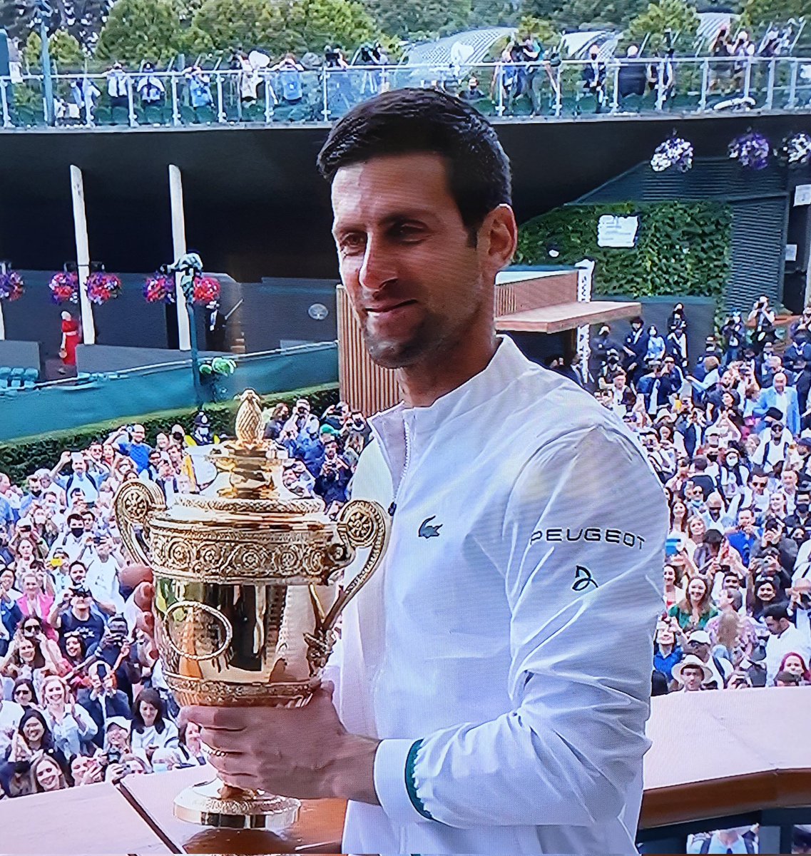 For every child suffering the devastation of world greed, for every war torn country. Today right here is the "peoples champion"
<a href="/DjokerNole/">Novak Djokovic</a> 
#GOAT