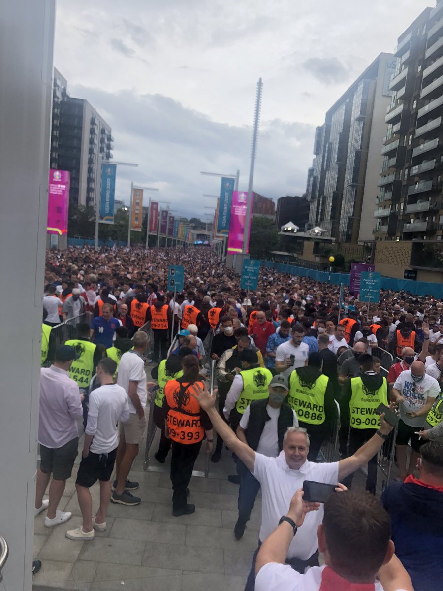 GingerCircus's tweet photo. Bonkers. The queue to show you’re Covid safe in a crowd! 🙄 https://t.co/oJUqUaiw0B