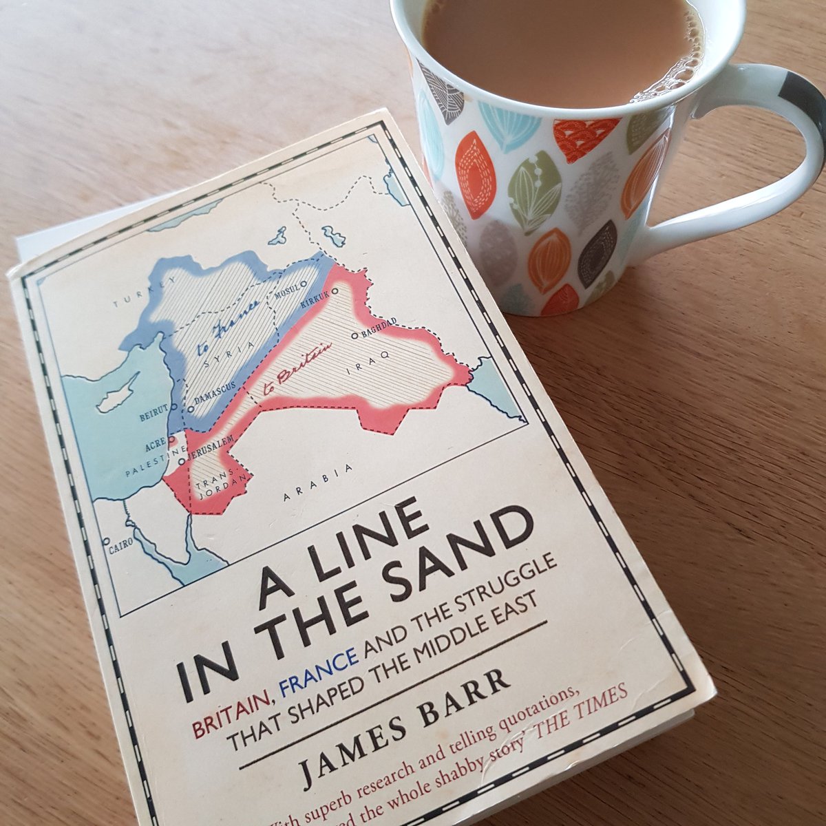 A_C_Regan's tweet photo. Avoiding the football with this magnificent book #ALineintheSand by @James_Barr duplicity and skulduggery writ large. https://t.co/wsRsM0Uugg