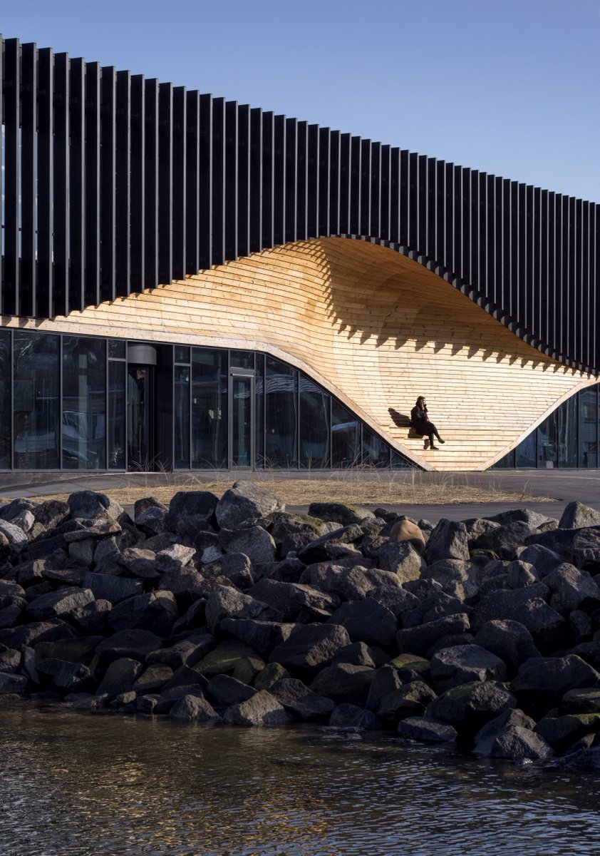 dezeen's tweet photo. Klimatorium is a landmark climate centre in a Danish harbour: https://t.co/QsEqOhObh1 https://t.co/oNe8yyS6Ia