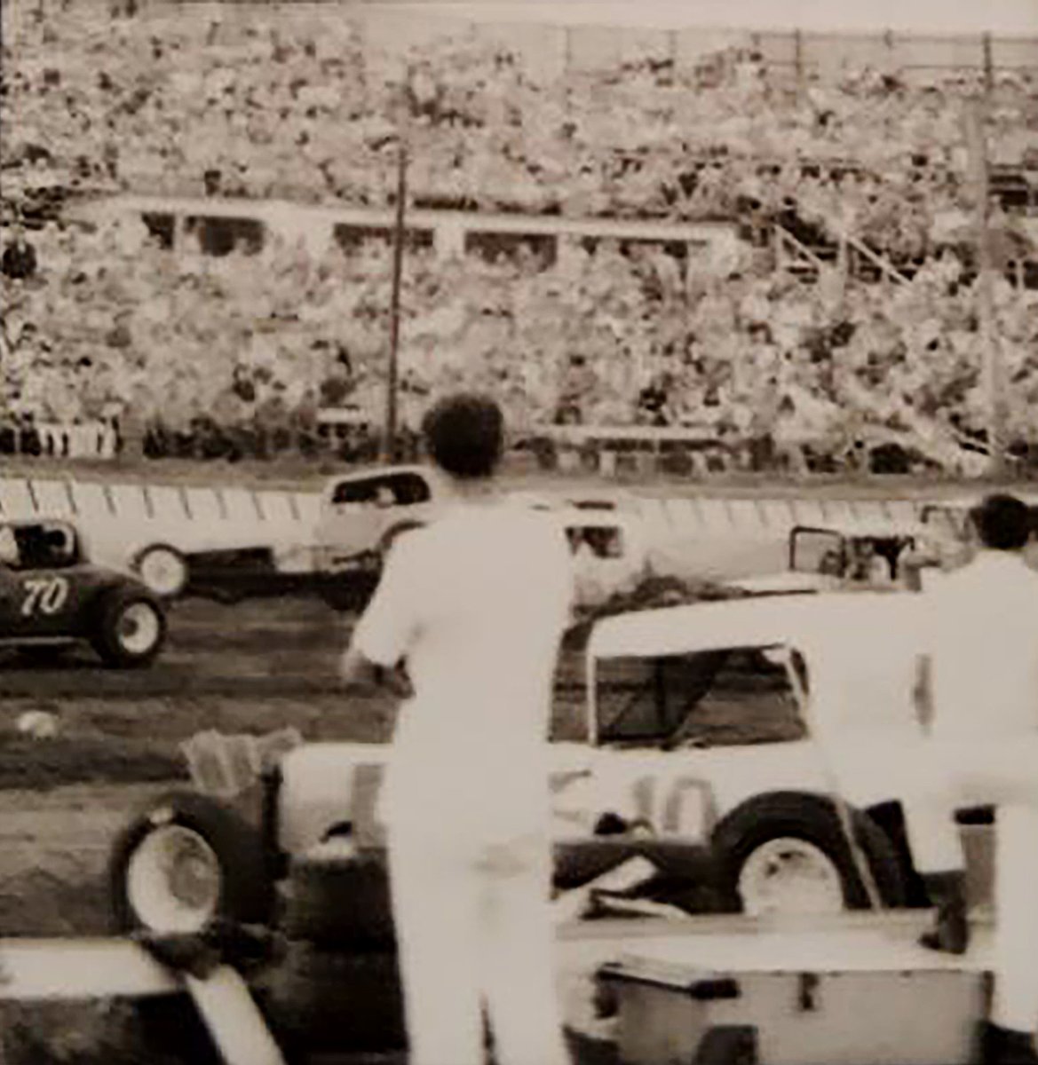 HusetsTimeline's tweet photo. 1970 - Huset's Speedway - A full grandstands enjoying the races. Larry Plucker #10 and Bill Weinkauf #70 (from the Tom Savage collection)

This photo must have been taken at the start of a race. There is a car on the front straightaway that is in trouble. https://t.co/yGdXLk8kAn