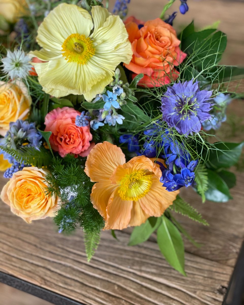 A little something to brighten your Monday.  #mondaymotivation #mondayflowers #bright #beautiful #poppies #icelandicpoppy #nigella #delphinium #orangeandblue #blueflowers #gardenstyle #natural #vibrant #summervibes #outfordelivery #sayitwithflowers #thelanguageofflowers #helenoli