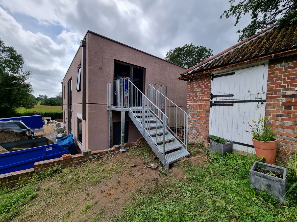 Another bespoke staircase fitted on this gradient hill #brightonandhove #steel #galvanisedsteel