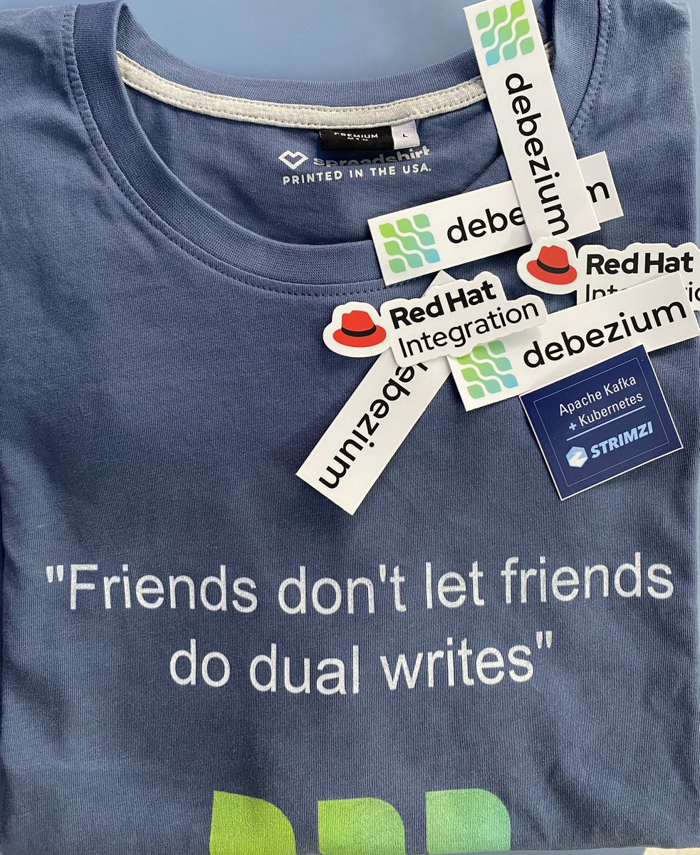 uidoyen's tweet photo. Now THAT’S some cool #swag. Thanks @debezium &amp; @RedHat 🤩 https://t.co/NQ2ndoqNev
