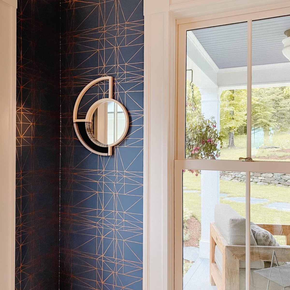 Another look at the handwoven Mirror Wall Art perfectly placed in this well-lit dining room. ➡️: l8r.it/eidz #interiordesigners #handmadegifts #burbankinteriordesign #interiordesignnyc #wallmirror #contemporarywallart #vermontinteriordesign#moderncontemporary