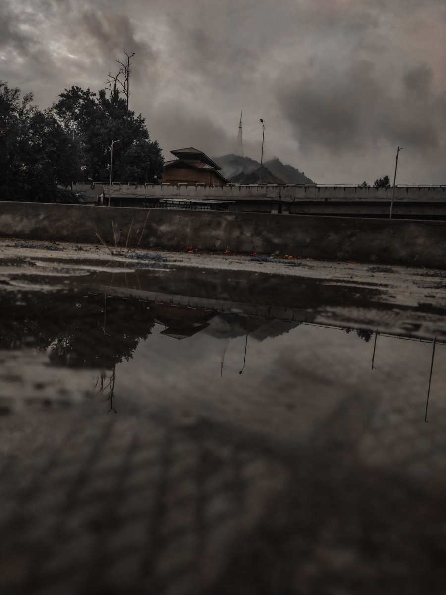 A whole new world in a puddle

#reflection #reflectionphotography #monochrome #tower #flyover #urbanstreetphotography #mountain #tower #rain #clouds #mundane #shotbymi #farazandthelens #kashmir #trc #puddle #puddlereflection #puddlephotography
