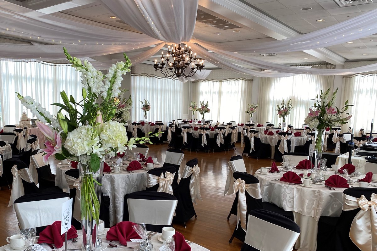 Weddings are back! Here's a peek at a June wedding  where were transformed a standard function room to a magical place to begin a 'happily everafter'. A Cinderella Ceiling and elegant flowers can change the mood of any room. Let us make your special day a dream-come-true!