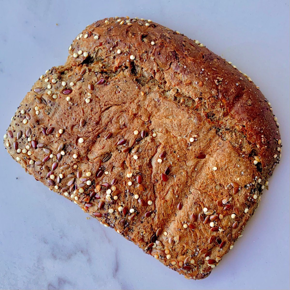 KillerBread's tweet photo. What do you call this slice of bread? 👇 Are you #TeamButt 🍑 or #TeamHeel 👠 https://t.co/omk8BKxYD0