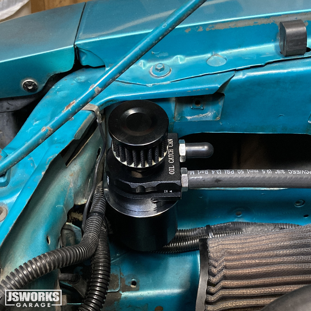 jsworksgarage's tweet photo. Been trying to decide how to mount this oil catch can on #ProjectMidLifeCrisis for weeks! The factory bracket is flimsy &amp; only gives you one way to clock it. While staring at the engine bay last night, I noticed the old 2-5/8” interior gauge bezel on the shelf, and had an idea... https://t.co/OKqDnIws4X