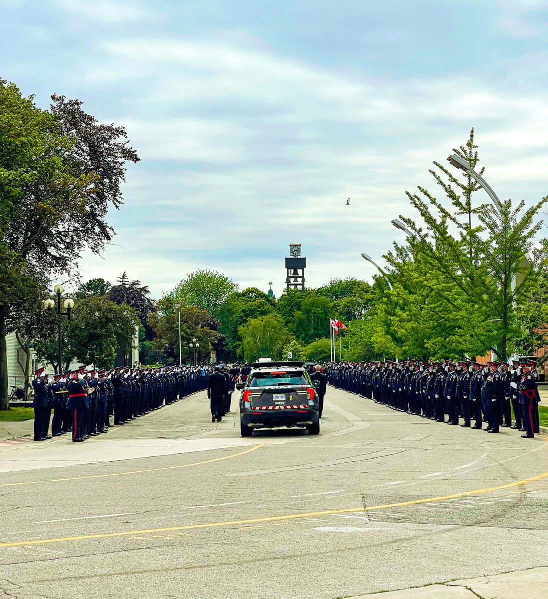 The final salute. Members of 52 Division Toronto Police salute the hearse carrying Cst. Jeffrey Northrup, as he heads towards his final resting place. We continue to keep his family, friends and colleagues in our thoughts and prayers.