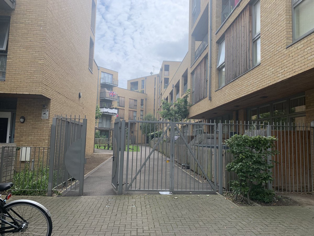 This is the development off Camberwell New Road &amp; Bolton Crescent, built on green space.

At planning permission stage, active frontage (shops) was promised at the ground floor, as well as permeability.

This isn’t really permeability, if gated. Can we do better, near red routes?