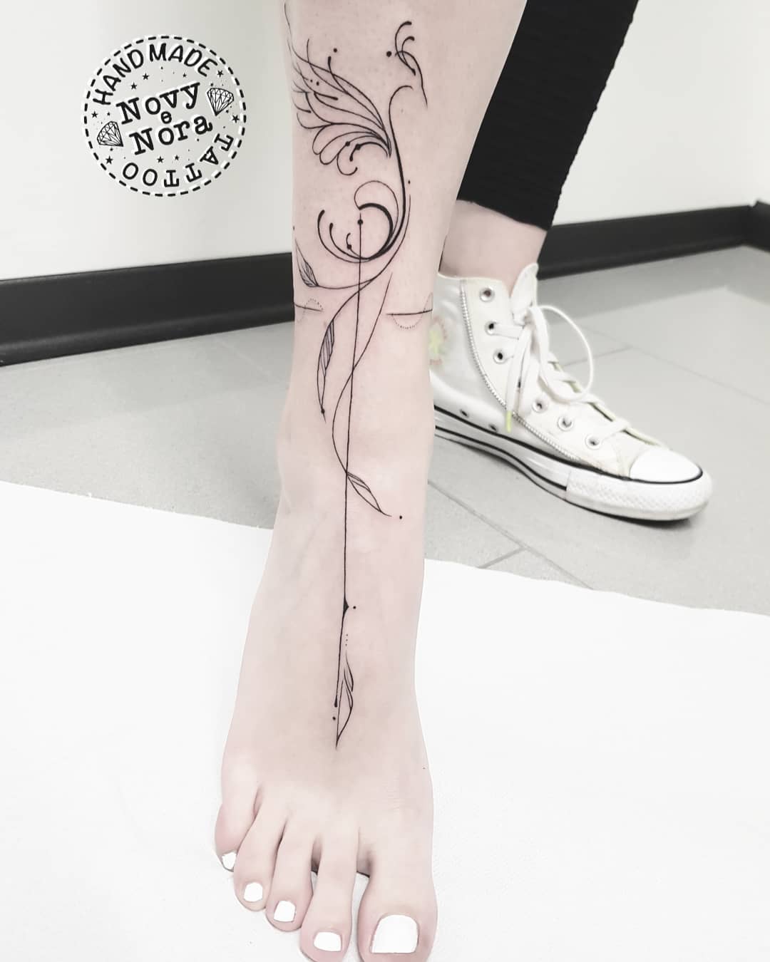 phoenix tattoo ankle