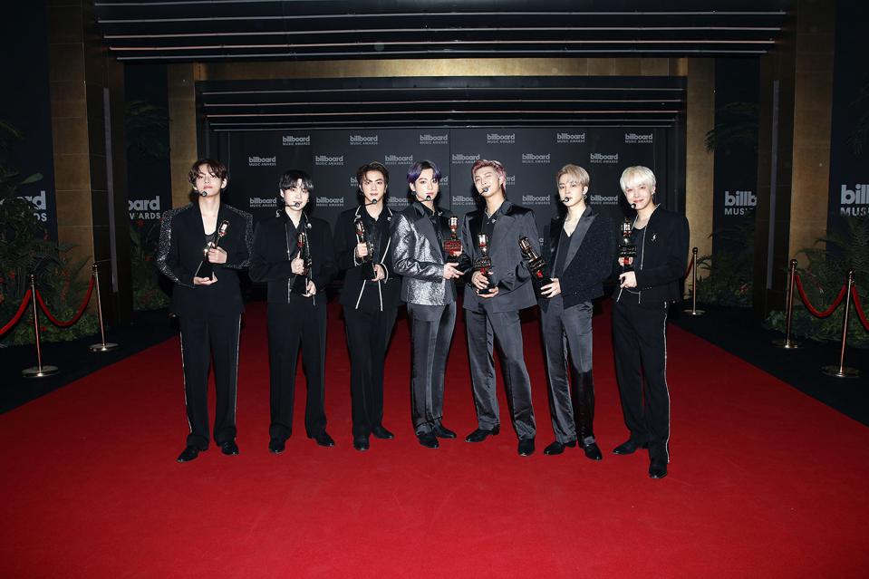 Forbes's tweet photo. BTS Claim The Two Bestselling Songs In America Halfway Through 2021 https://t.co/qGiEVaP0AS https://t.co/huKFIbbhEY