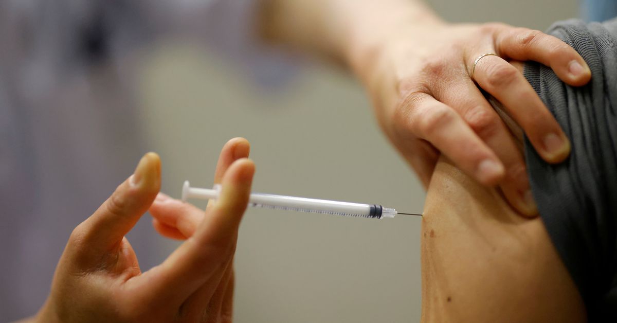 Reuters's tweet photo. 'We have rights': the French health workers furious about COVID vaccine order https://t.co/vYCGARTREq https://t.co/ARLC0JSbw8