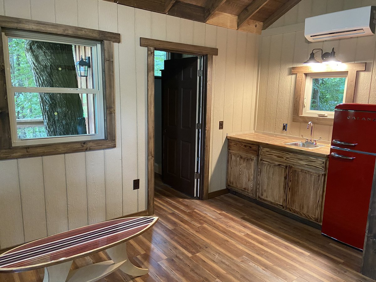 CherryTreesort's tweet photo. Inside is almost done! Trim and base boards finished. Water running, toilet flushing, lights on, and surfboard headboard installed. Just need some furniture built and we are set. Looking to open next Friday. #cherrytreesort #TheTolson https://t.co/iAxzWefRmM