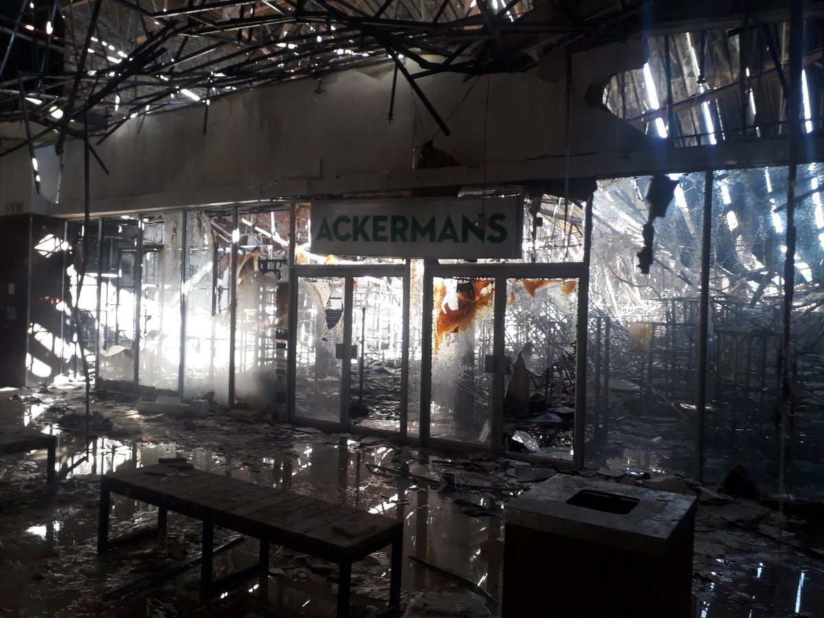TeamNews24's tweet image. #ZumaUnrest Remnants of what was Ackermans store that was looted and gutted at Chris Hani Mall in Vosloorus (@ntwaagae)