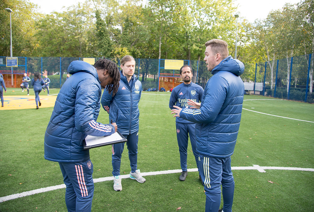 AFCCommunity's tweet photo. The Arsenal Community Coach Development Programme gives volunteers the opportunity to gain football coaching skills and experience whilst representing the Club in London and potentially (COVID permitting!) around the world. Apply now to start in September. https://t.co/XcSvx5I8rC https://t.co/s0MtoGy6Wo