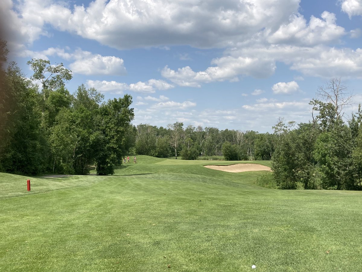 #13 today.   The safe play is an iron that goes 165 yards over the hill on the left edge of the fairway.  Leaves you about 110 yards into this awesome green location.  Can also go for the green with driver, the line would be just left of the cart part from the blue tees!