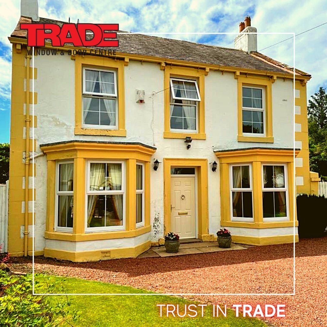 A fresh window &amp; door makeover for this lovely period home in Wetheral for Mrs Ross. A Devon Cream Galaxy composite door, adorned with traditional gold furniture. The door is surrounded by white A-rated casement windows with internal Georgian bars for a touch of period style.