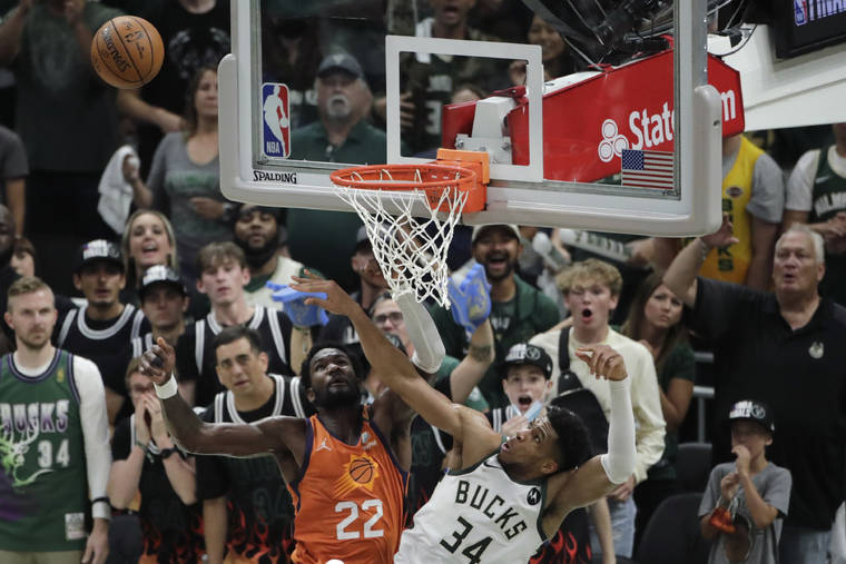 Khris Middleton sends Bucks past Suns to tie NBA Finals at 2 2