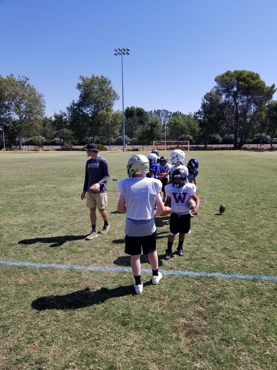 ButteFootball's tweet photo. @ButteFootball coaches got a chance to get some solid camp time in this morning with the Q's and Wideouts from all over the place. Great to see so many out working to get better! #BCPride https://t.co/7Sam4jgsjP