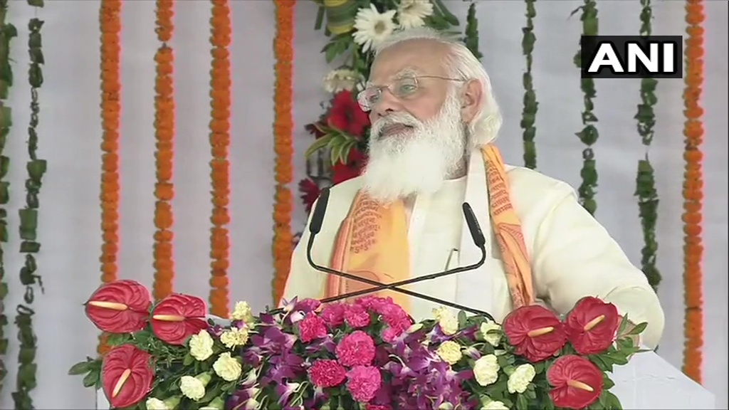 ANINewsUP's tweet photo. He (CM Yogi Adityanath) is quickly moving forward in making a modern UP, there is rule of law in UP today. 'Mafia raj' and terrorism have been brought under control. Today, criminals who cast an eye on women know that they won't be able to hide from the law: PM Modi in Varanasi https://t.co/QjJdlpNauw