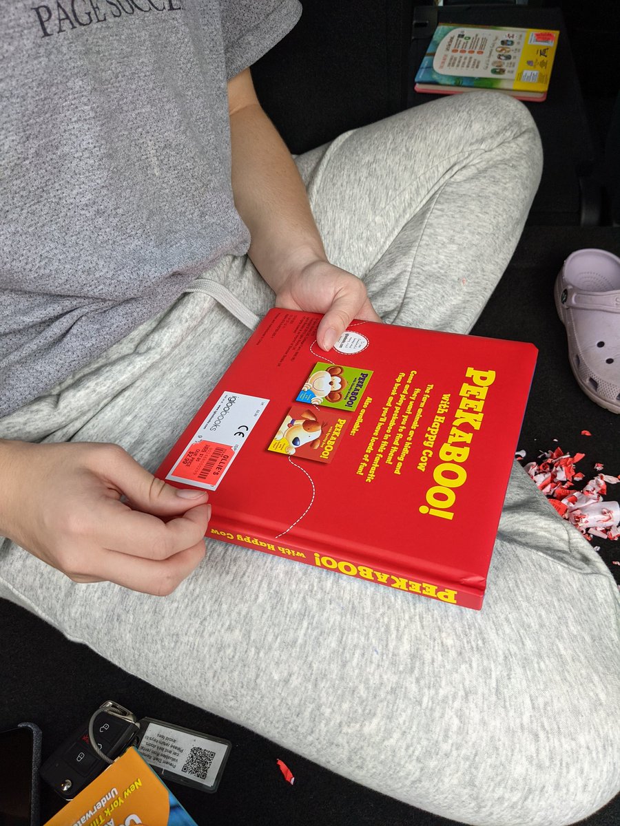 anthonyschow's tweet photo. My daughter Emma taking off stickers from the books we purchased from Ollie's so we can handout 50 books to the Head Start program later this morning! Oh, and my car has a flat tire :)! Need more coffee.... @NationReading @SJSUiSchool @lisuncg @nclaonline #rnw #lis674 https://t.co/09I1qAoMPT