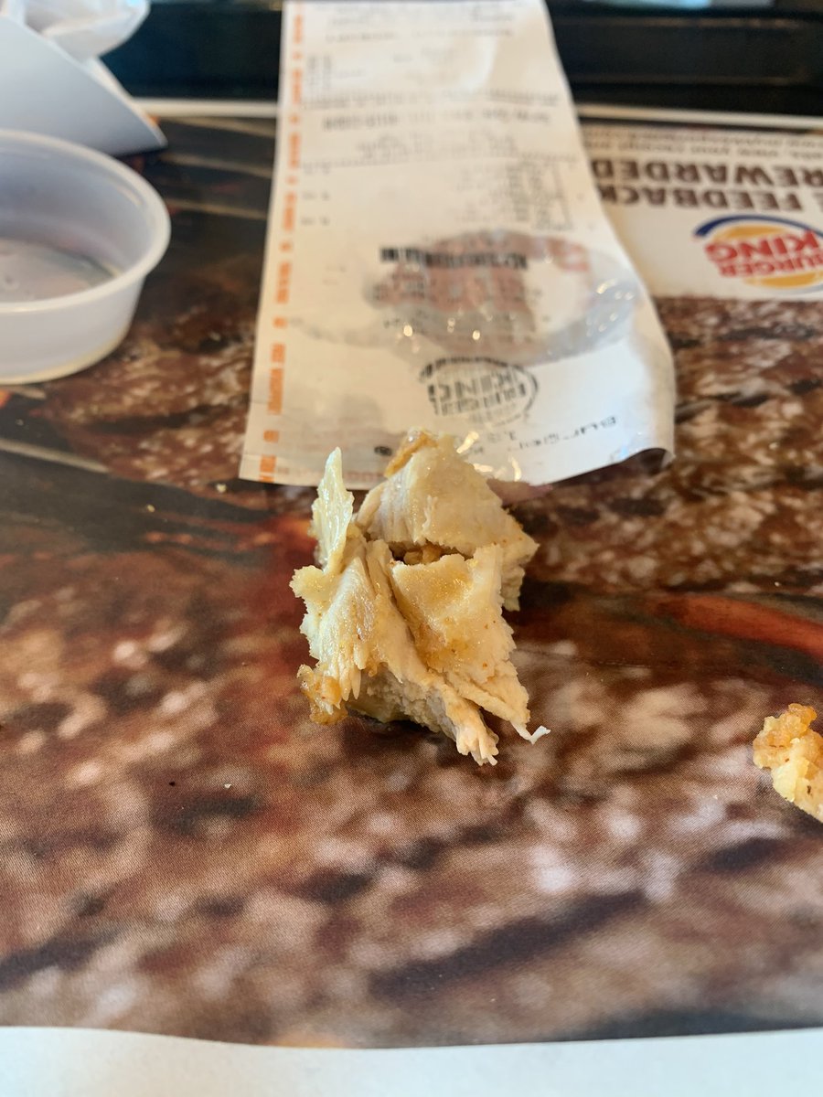 RanaissanceMan's tweet photo. So since they haven’t contacted me as promised I’ll make it public, which I didn’t before. Went to @BurgerKing 2 get the new sandwich. Bit into it and found something hard and dense in the middle. Not a foreign object, more like a growth or something!! 🤢🤮 Do not recommend!! https://t.co/JkNhFzQqLx