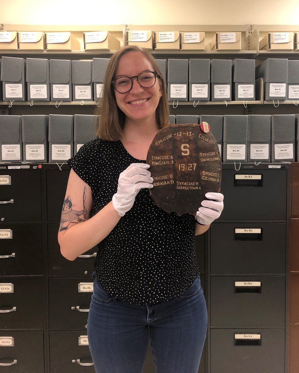SyracuseULib's tweet photo. Meet @SyracuseU Archives student employee Emily Banach G'21, @iSchoolSU LIS graduate student! 🧡

Emily has been working in the Archives since this past February, processing collections and creating finding aids for the University Archives and @PA103_Archives. https://t.co/EgZt183Gbk