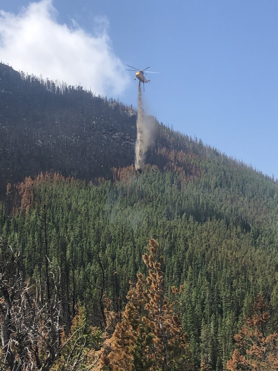 CusterNF's tweet photo. Some action shots from the #robertsondrawfire yesterday. Red Lodge residents can expect to see helicopters keeping hotspots down going into a hot weekend. #FireYear2021 https://t.co/BBjOvvEpGu