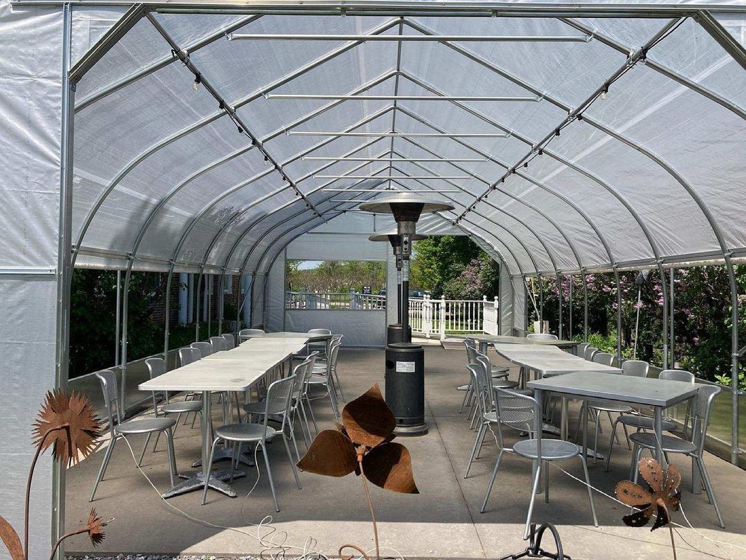 The 18x36 Rimol East Point #Greenhouse located at Kitchen Table Bistro in #VT (installed by Vine Ripe Greenhouse Co.) is a beauty! It is used for #outdoordining &amp; designed with woven poly covering for durability and roll up sides for temperature control. Do you want to eat here?