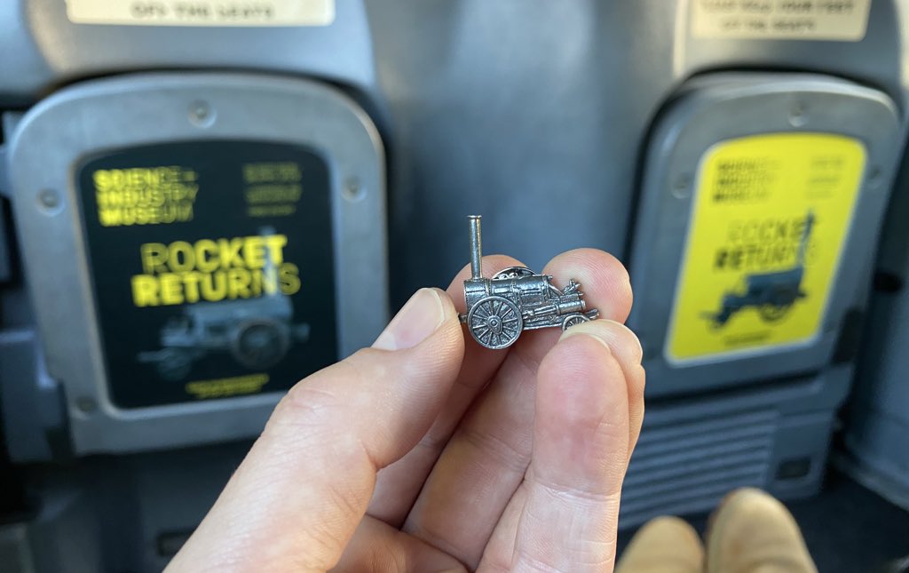 MrTimDunn's tweet photo. When you get in a taxi and the ads in the back are still advertising an exhibition which ended two years ago match the pin badge you still wear almost every day #ohsomaybeiamnotastrendyasithought #rocketreturns @sim_manchester #thisisstillcoolright? Guys? https://t.co/VCAGF3btXO