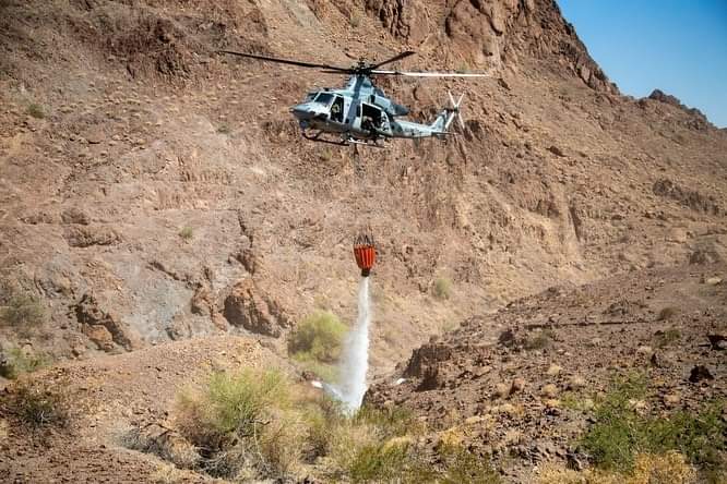 TheDeadDistrict's tweet photo. A #USMC UH-1Y Venom with #VMX1, dumps water into a watering hole near the Chocolate Mountain Aerial Gunnery Range, Calif., July 7, 2021.
Man-made watering holes help animals in the desert access water easily all year round.
#USMC 📸 by Lance Cpl Gabrielle Sanders. https://t.co/MKNbQrykK1