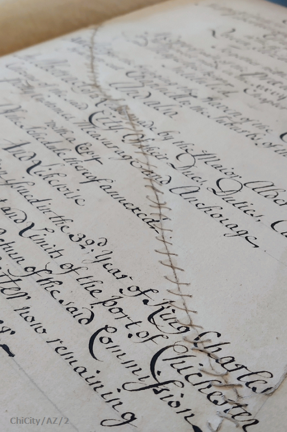 WestSussexRO's tweet photo. A copy of the Confirmatory Charter of 12, Elizabeth I to the Mayor [of Chichester] and Citizens. We appreciate this (historic) effort to visibly restore the record after it was torn. 🧵 #ExploreYourArchive https://t.co/fZncYqaLm6