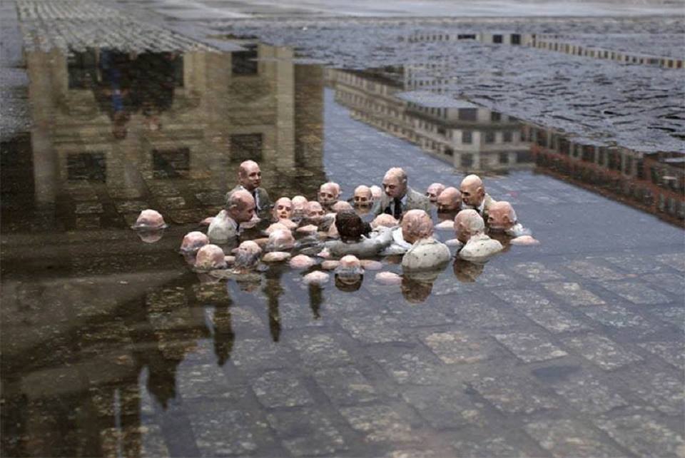 inthemoodfortw's tweet image. Politicians discussing global warming © Isaac Cordal