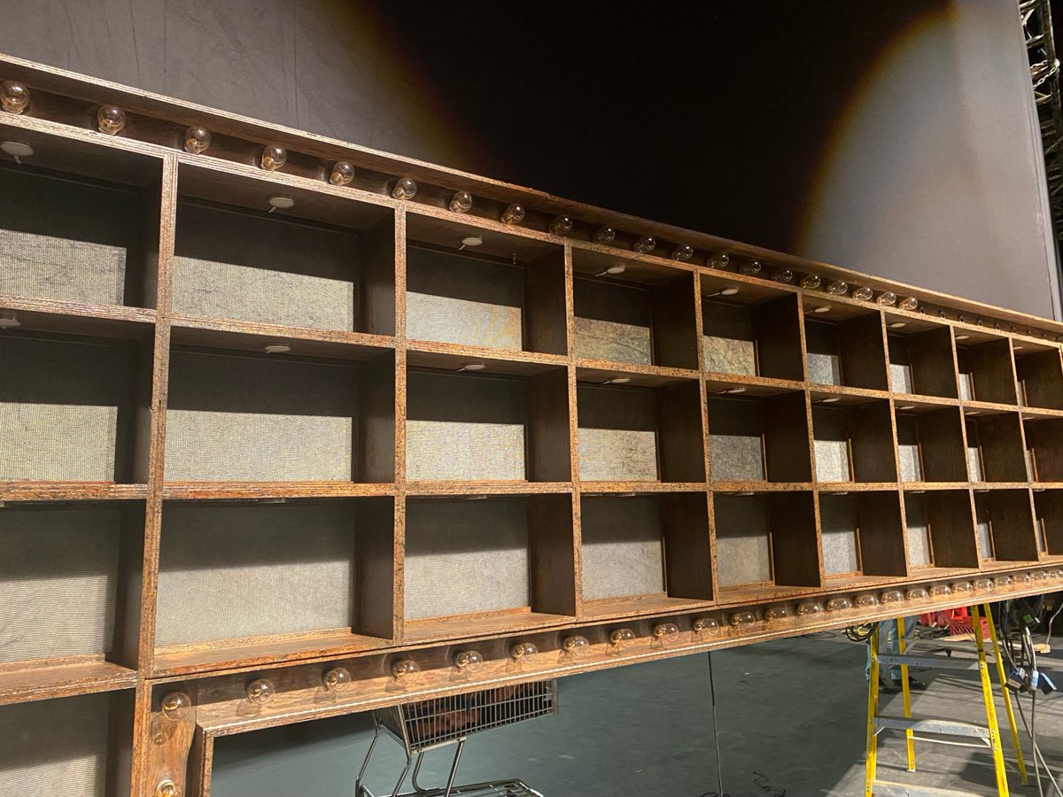 ParamountAurora's tweet photo. Our crews have loaded in the false proscenium for Kinky Boots. The proscenium is comprised of cubby holes that will hold shoes. A total of 200 shoes will be in this proscenium. π #ParamountKinkyBoots #BuiltInAurora https://t.co/rEmRGvVOwC