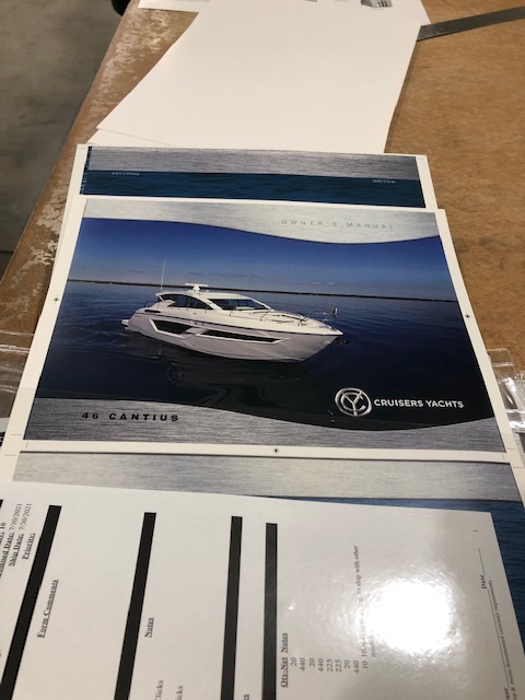 Hot off the press! The 2022 MY owner's manual covers are ready for trimming and plastic coil binding. This model has a lower production quantity and is printed on demand as needed. Are your manuals ready? Contact us and we can help... <a href="/CruisersYachts/">Cruisers Yachts</a> 
KenCook.com/industries/mar…