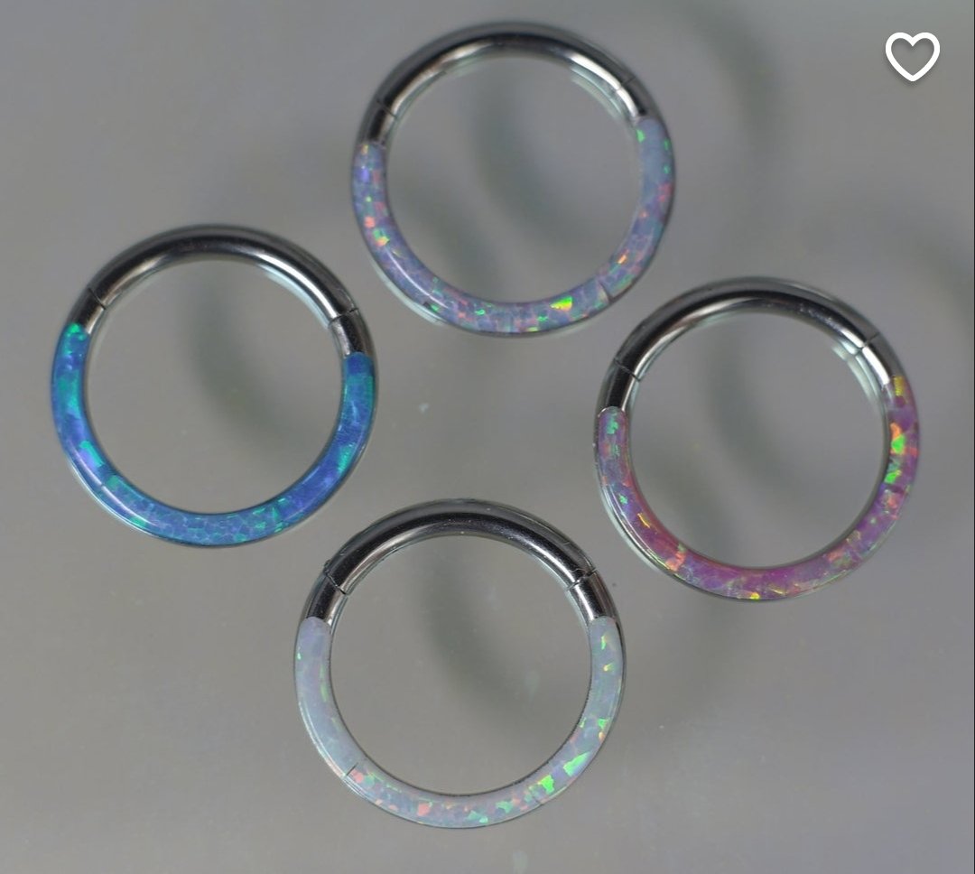 Nubbinsss's tweet photo. I decided to do a grown up thing and get my face pierced! Getting a septum piercing so hopefully i can start my life with these babies. Opal stones as an omage to Moon (+ they pretty) https://t.co/Sdq7tCYD8H