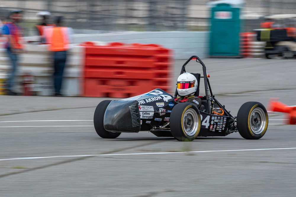 UAkron_Engr's tweet photo. Zips Racing Electric placed 2nd in acceleration, skidpad, and autocross at FSAE Michigan event. Yesssss! #AkronEngineering #ZipsRacing #EV #ElectricVehicle #ElectricCar #UAEngineering  #GoZips https://t.co/GQBEQ5uRY0