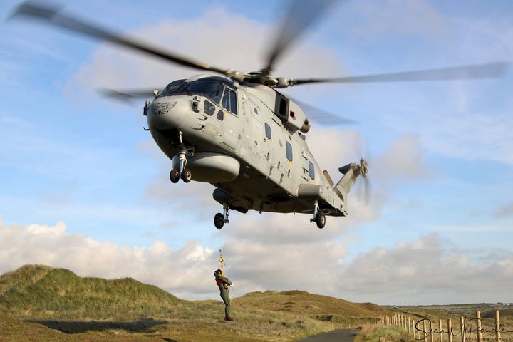 RNASCuldrose's tweet photo. Marvellous pictures here from @SeanMcRandle Aviation Images of one of our #814NAS Flying Tiger crews practising landings and winching at #Penhale #Newquay #Cornwall on Wednesday. Thanks for sharing Sean @RoyalNavy #navy #Merlinmk2 #helicopter #FlyingTigers https://t.co/Ddi5CFPu00