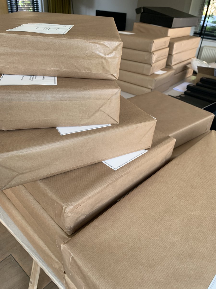 RedboneBindery's tweet photo. One small step to the post office, one giant leap for preventive book conservation.  Our Kickstarter book cradles and sundry are off to their new homes. https://t.co/DJ4AfOOiVZ