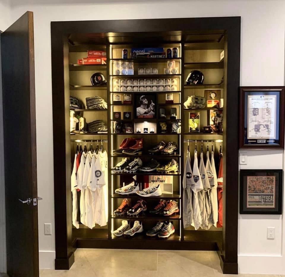 Reach-in closets can still be high-end. Make one your display case with lighting for your valued memorabilia.